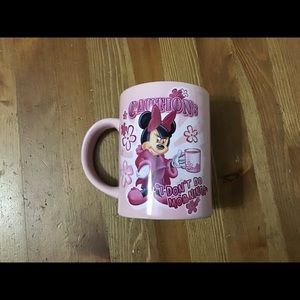 Minnie Mouse pink coffee mug.